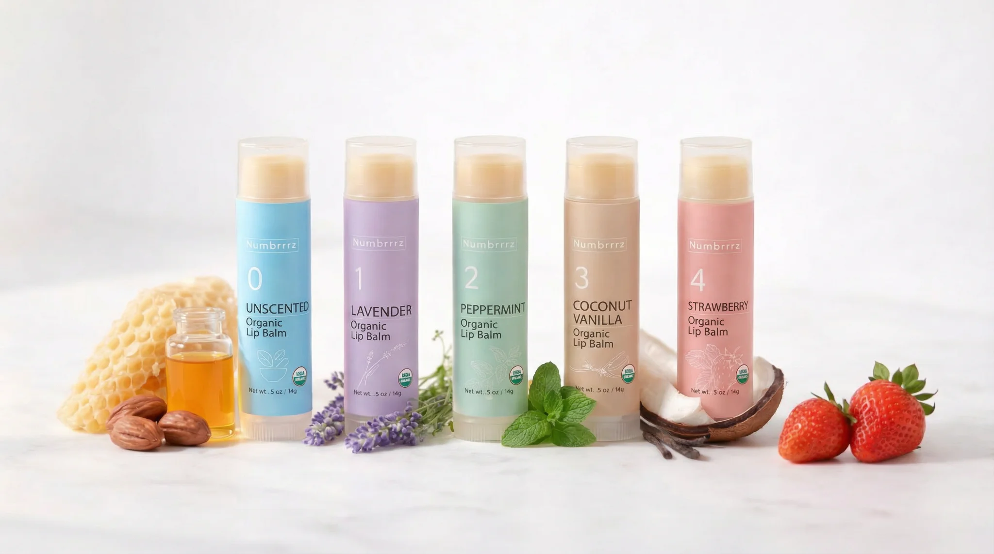 Numbrrrz organic lip balm lineup — Unscented, Lavender, Peppermint, and Coconut Vanilla with natural ingredients