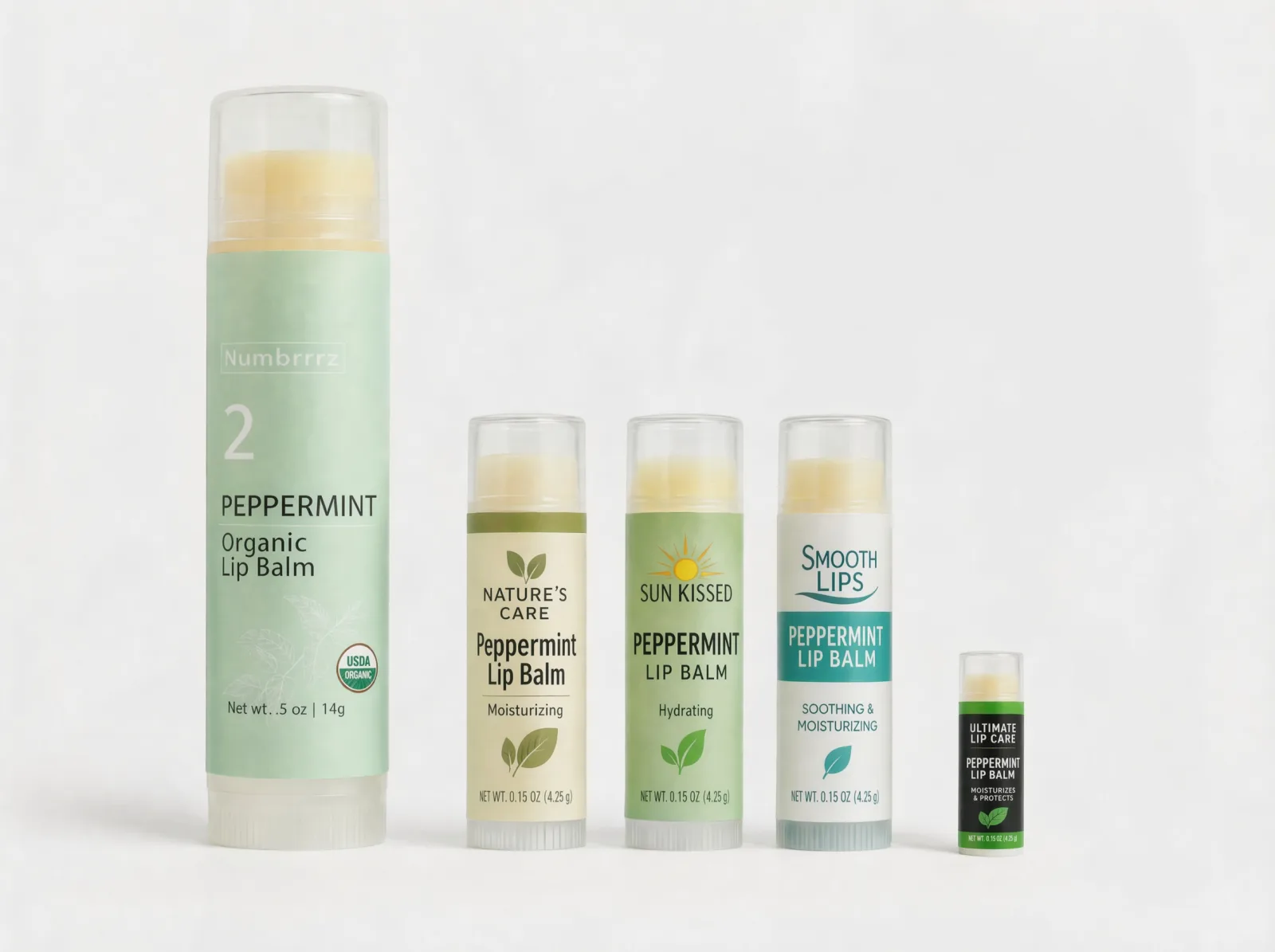 Numbrrrz Peppermint 0.5 oz tube next to four standard 0.15 oz drugstore lip balms — Nature's Care, Sun Kissed, Smooth Lips, Ultimate Lip Care