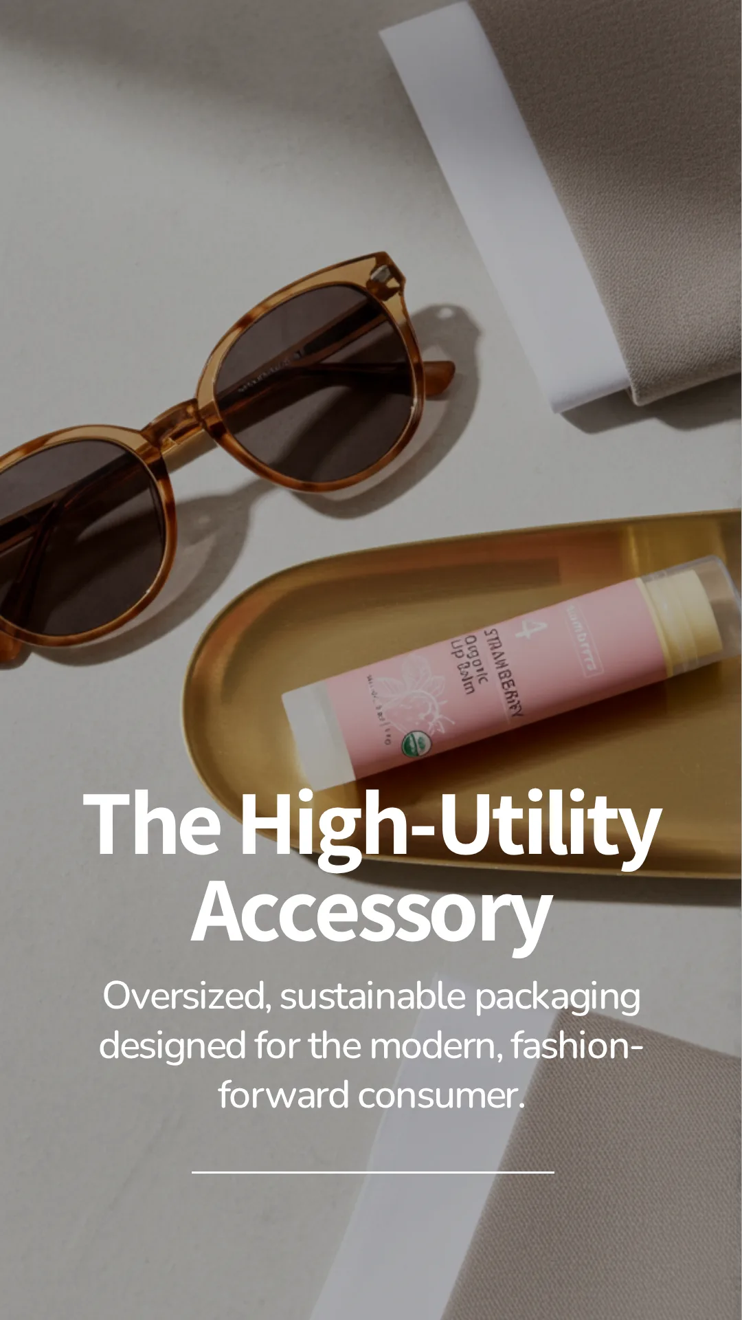 The high-utility accessory — Numbrrrz lip balm on gold tray